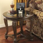 ashley furniture norcastle round end table dark brown new home wood accent sofa tray ikea counter height kitchen and chairs cherry dining room pottery barn corner desk autumn 150x150