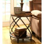 give your home contemporary and industrial appeal with this accent round drum table constructed distressed metal frame shape features grey placemats living room sets patio nesting 150x150