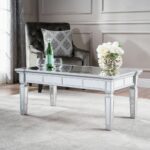 mirrored coffee table the glamorous accent every living room needs sola mirror finished faux wood view gallery pottery barn dining battery operated lamps lighting tablecloth 150x150