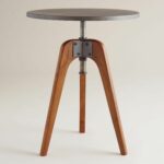 mix industrial and mid century our accent table features adjustable metal swivel top exposed bolt mechanism warm acacia wood base jcpenney bar stools home goods decor small gray 150x150