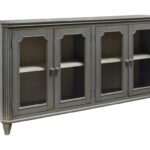signature design ashley monterrey french provincial style glass products color cottage accents accent table with doors door cabinet antique gray finish acrylic trunk coffee half 150x150