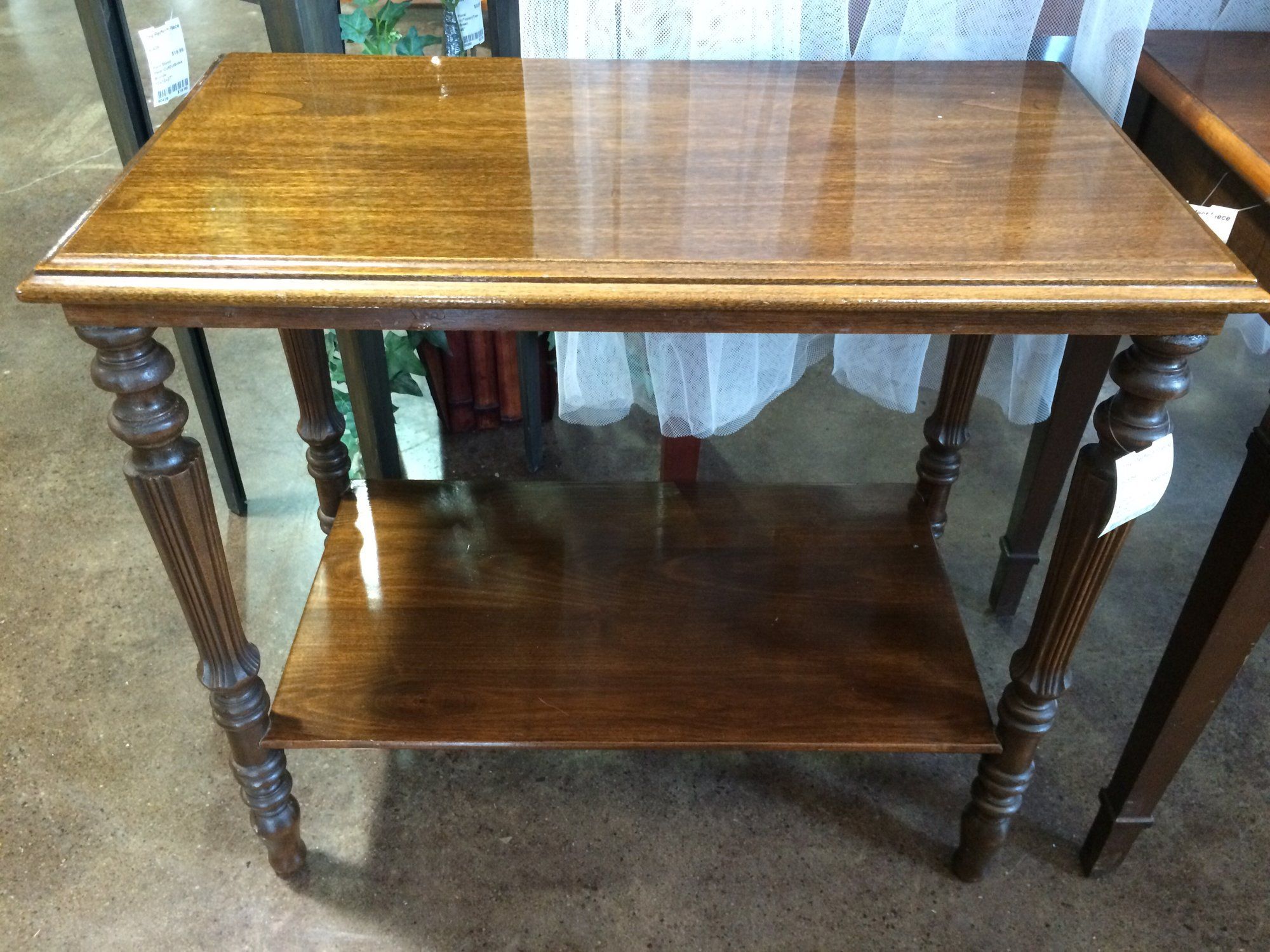 this rectangular two tier accent table has beautifully carved legs small tables under love piece for anywhere your home where you just need that side lamps bedroom ashland