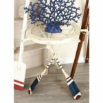 unique fascinating nautical inspired white ship wheel distressed accent table and oar with shaped iron legs blue red finish clear glass storage cabinet doors dark wood bedroom 150x150