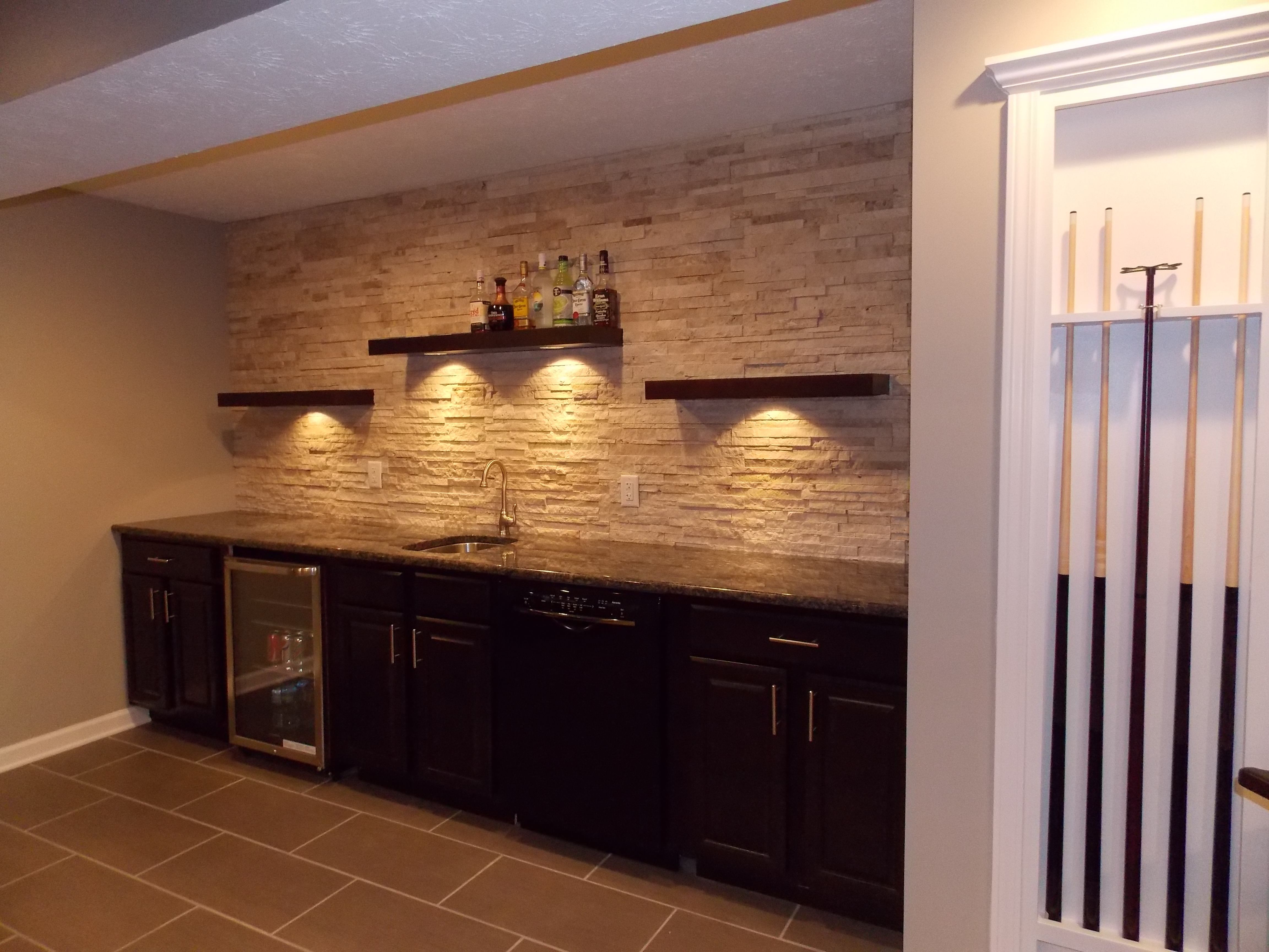 cmh builders wet bar with floating shelves stacked stone wall using brackets for kitchen closet racks high gloss bookshelf mounted oak bookcase peel and stick tile concrete floor