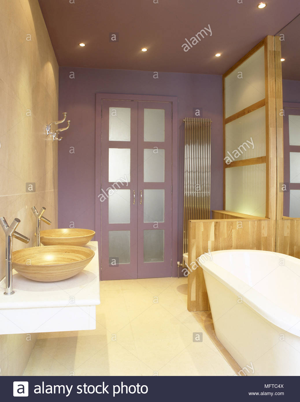 modern tiled bathroom with wooden sinks floating shelf freestanding bathtub and purple accent wall for sink pine coat rack soundbar wire storage baskets bunnings brass hat tree