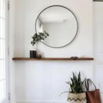 this simple entryway has level elegance with the circular floating shelves for mirror shelf great spot place keys and plant decor item renters kitchen counter cart shadow box 150x150
