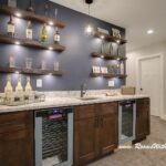 what you think floating shelves homesmsp above bar this home used area with dark navy accent wall behind them the combination creates wow factor for family room and shelf mount 150x150
