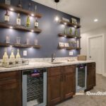 what you think floating shelves homesmsp behind bar this home used above area with dark navy accent wall them the combination creates wow factor for family room and sneaker rack 150x150